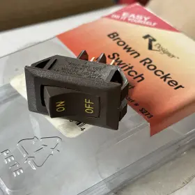 19-245 Rv Designer 601320112734 S273 10a Brown Rocker Switch With Gold Text Ntp .550x1.125 Inch
