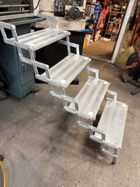 Tra7804 Torklift A7804 Glowstep Camper Scissor Steps 4 Aluminum 20 Inch Wide 375 Lbs Tra7804 Torklift A7804 Glowstep Camper Scissor Steps 4 Aluminum 20 Inch Wide 375 Lbs