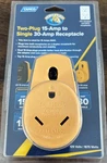 Camco Powergrip Rv Two-plug 15-AMP To Single 30-AMP Adapter Receptacle 125V. Fixed Price $21.00.