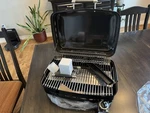 Outdoor Unlimited Camper / Side-kick Grill RV-500 With Hanging Rack Stand. Fixed Price $100.00.