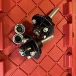 2PK Round BT8 Spindle & On 4" Bolt Idler Kit With 1" Hub For 2000 Lbs Trailer. Fixed Price $100.00.
