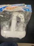 Relaqua 4 Shower Faucet White. Fixed Price $35.00.